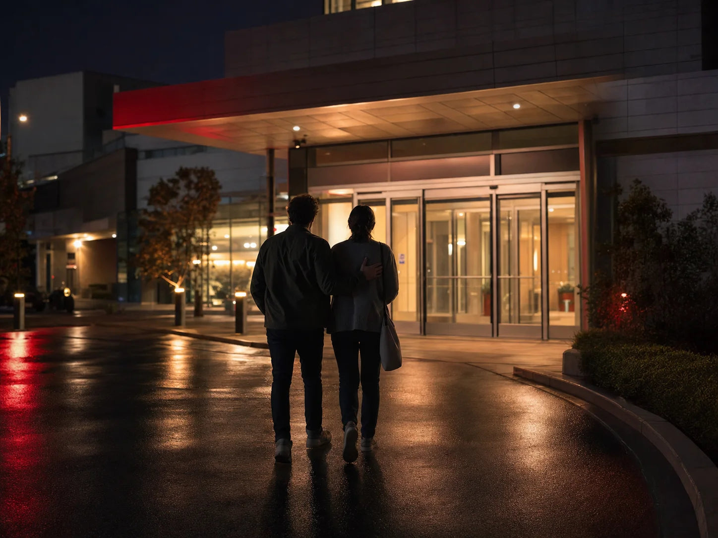 Editorial scene of two people approaching urgent medical care