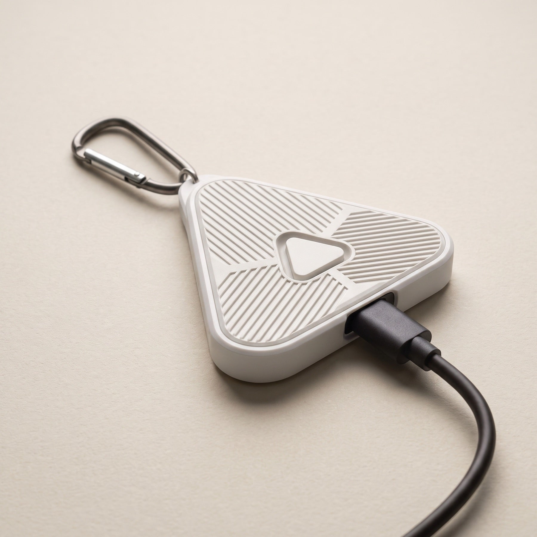Slate Signal connected to its charging cable